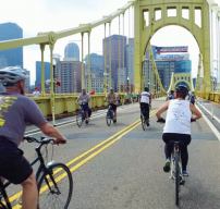 biking on bridge photo